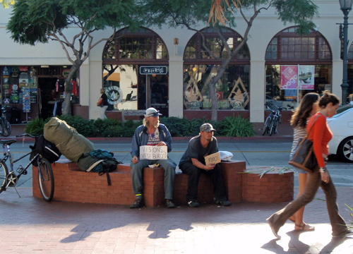 Homeless men begs for food in State Street
