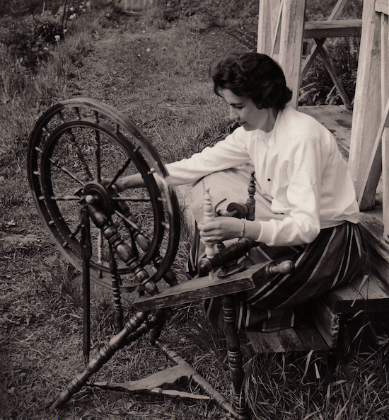 Mom at the spinning wheel.
