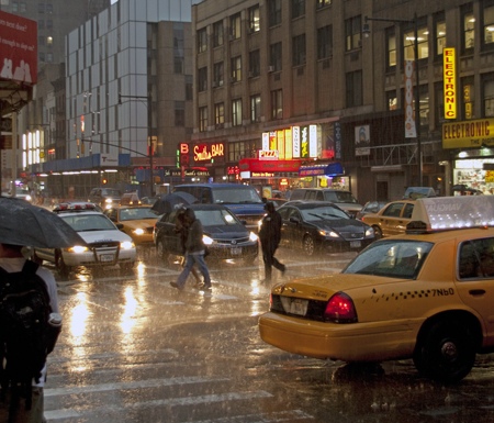 Rain on 8th Av. 45 St. in Midtown Manhattan